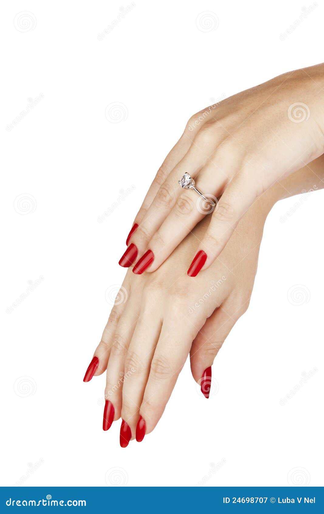 Les mains de plan rapproché de la jeune femme avec la manucure rouge ... Les mains de plan rapproché de la jeune femme avec la manucure rouge ...